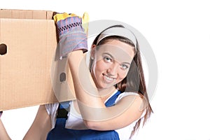 Young woman carrying moving box