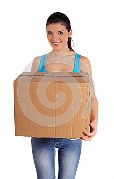 Young woman carrying a moving box