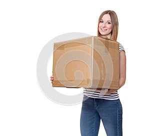 Young woman carrying moving box