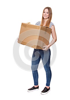 Young woman carrying moving box