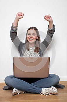 Young woman celebrating success