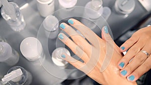 Young Woman Choosing Hand Skin Care Cream in Cosmetics Supermarket. 4K.