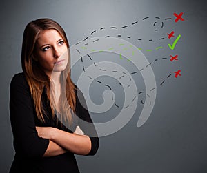 Young woman choosing between right and wrong signs