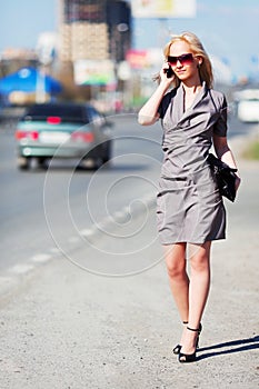 Young fashion woman calling on the mobile phone