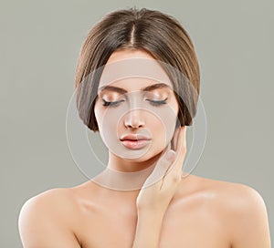 Young woman with clear healthy skin portrait