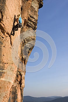 Young woman climbing