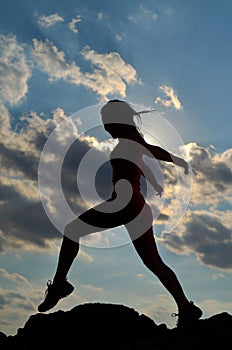 Young woman climbing