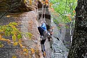 Young woman climbing