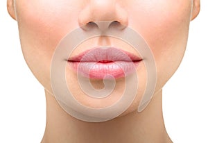 Young woman close up. plump lips photo