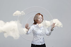 Young woman and cloud, weather forecast concept.