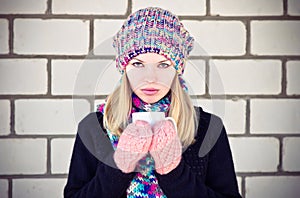 Young Woman with cofee cup Winter time