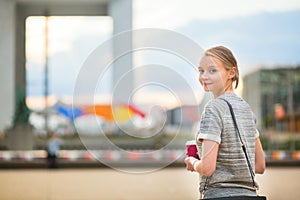 Young woman with coffee outdoors