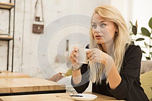 Young woman at the coffee shop