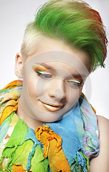 Young Woman with Colorful Makeup and Short Painted Coiffure
