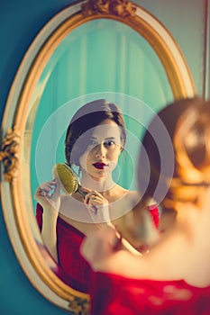 Young woman with comb