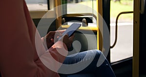 Young woman commuting on a bus