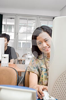 Young woman in computer course