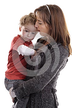 Young woman consoling a child