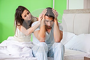 The young woman consoling disappointed impotent husband