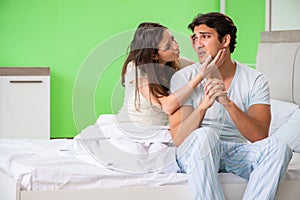 The young woman consoling disappointed impotent husband