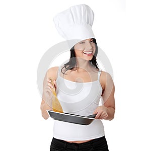 Young woman cooking healthy food