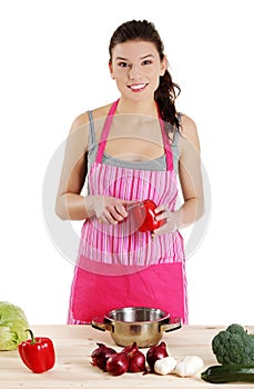 Young woman cooking healthy food