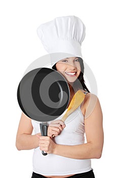 Young woman cooking healthy food