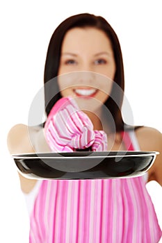 Young woman cooking healthy food