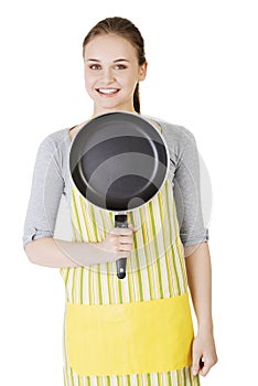 Young woman cooking healthy food