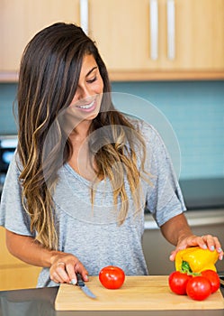 Young Woman Cooking. Healthy Food