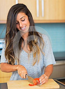 Young Woman Cooking. Healthy Food