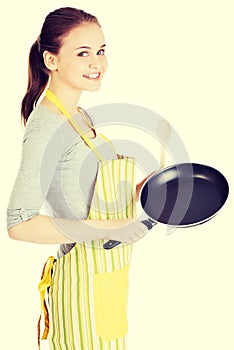 Young woman cooking healthy food