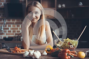 Young Woman Cooking. Healthy Food - Vegetable Salad. Diet. Dieting Concept. Healthy Lifestyle. Cooking At Home. Prepare