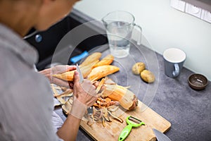 Young woman cooking in her modern kitchen