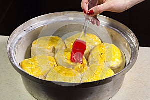 Young Woman Cooking a Homemade Bread