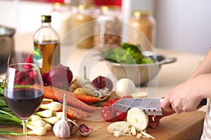 Young Woman Cooking in the kitchen. Healthy Food