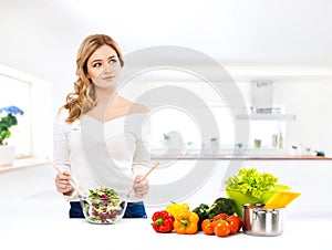 Young woman cooking in a modern kitchen