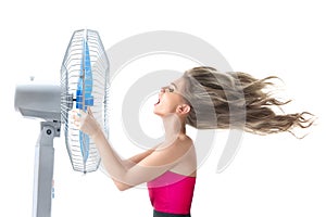 Young woman with cooler fan