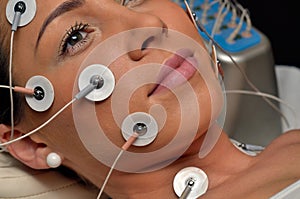Young woman during cosmetic treatment photo