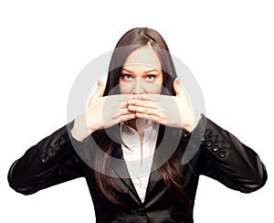 Young woman covering her mouth with both hands