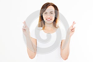 Young woman cross fingers for wishing good luck isolated on white background.Template blank summer t shirt. Copy space. Mock up