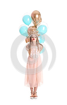 Young woman with crown and air balloons