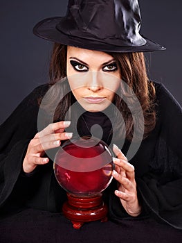 Young woman with crystal ball.