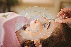 Young woman at crystal healing session