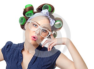 Young woman with curlers