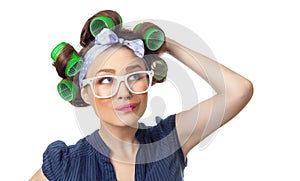 Young woman with curlers