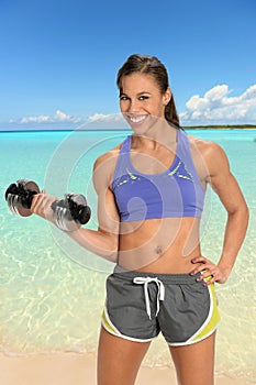 Young Woman Curling Dumbbell