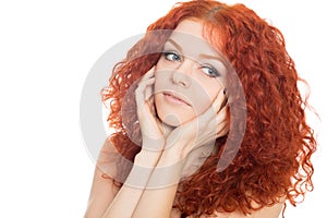 Young woman with curly red hair