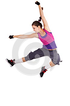 Young woman dancer jumping