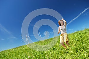 Young woman dancing on the field